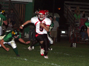 Kyle Daly is off to the races as he runs through a huge hole in the Potlatch defense.