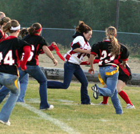 Meaghan Bruner gains yardage after making a catch.