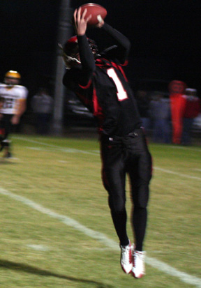 David Sigler leaps high to make a catch. He wound up scoring a touchdown on this play.