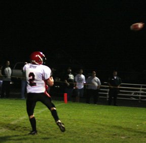 Conner Rieman is about to catch the ball for the final touchdown of the game.