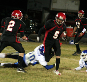 Kyle Daly breaks free from this defender and heads toward the goal line. He shrugged off another would-be tackler at about the 10 as he scored from 47 yards out.