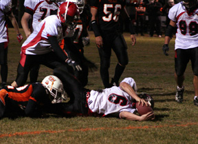 Branden Waller reaches for the goal line.
