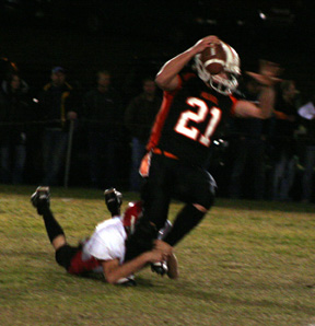 Cody Miller sacks Troys quarterback. This play forced a punt that resulted in the first score of the game, a safety, as the punt snap sailed high over the punter's head toward the end zone.
