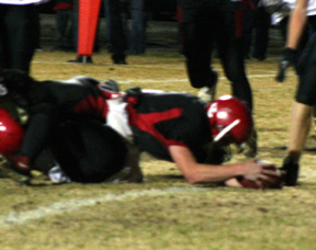 Branden Waller stretches for the goal line and a touchdown.