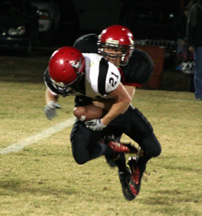 Andy Groom tackles Deary's Luke Seubert for a loss.
