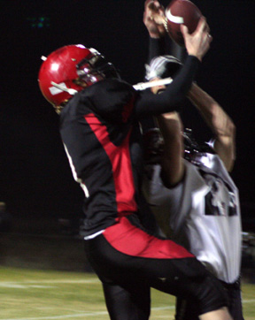 David Sigler catches a pass over the top of a Deary defender.