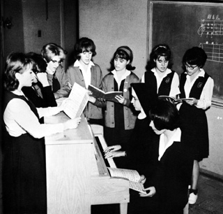 Sister Angela Uhlorn instructs members of St. Gertrude’s Academy’s First Tentet in 1966. Photo courtesy Monastery of St. Gertrude Archives.