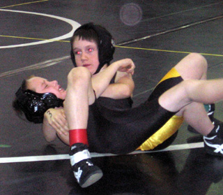 Hunter Chaffee is about to pin a Potlatch wrestler.