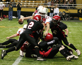 Conner Rieman, Tyler Forsmann, Kyler Shumway and Branden Waller held a meeting at the Troy quarterback, sacking him for a loss.