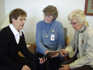 Irma Tacke, Sr Corinne Forsman and Helen Huntley, St. Marys Hospital NOSDA volunteers, plan the annual Memorial Service scheduled for November 22nd.