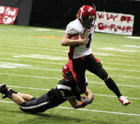 David Sigler converts a fourth down play with a 14 yard gain on a pass during the Pirates final TD drive.
