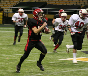 Kyle Holthaus gained 54 yards on a quarterback keeper to the right after a fake pitch to Kyle Daly got the defense to commit to the left.