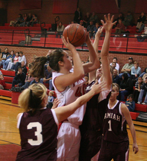 Kaylee Uhlenkott scores 2 of her game-high 19 against Kamiah.