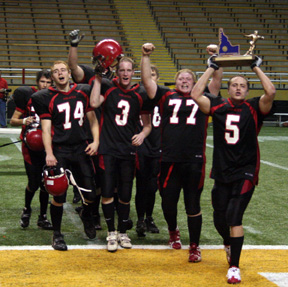 The seniors celebrate after receiving the championship trophy.