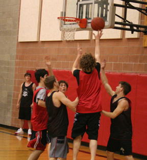 David Sigler shoots during a drill Monday at practice. Others from left are Branden Waller, Ryan Dalgleish, Kyle Daly, Seth Guyer and Kyle Holthaus.