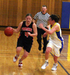 Jennifer Enneking tries to drive past a Genesee defender.