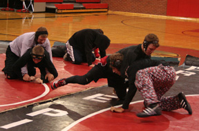Prairie wrestlers work on their moves during practice Monday. At left are Jeremy Ross and Sheldon Klinkefus and at right are James Jackson and Tyrell Langston. We're not sure who the pair in the back are.