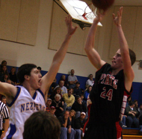 Tyler Forsmann puts up a shot from the elbow.