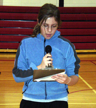 Whitney Sonnen reads her winning essay to the student body at Prairie Middle School.