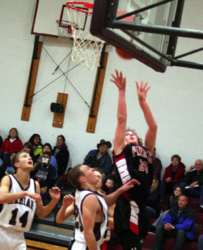 David Sigler scores on a lay-up after driving the baseline under the basket.