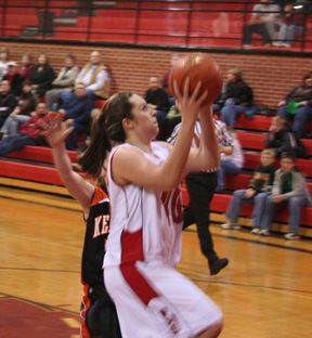Kaylee Uhlenkott scores a lay-up against Kendrick.
