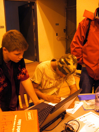 Tyson Hartnett and Tyler Hankerson working on their presentation