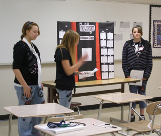 Shayla Sears, Rachel Falzon and Tiffany Stinson presenting their information on climate.