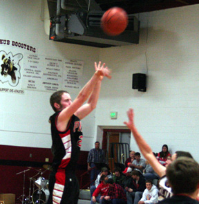 Tyler Forsmann shoots for two of his 14 points from the elbow in the second quarter. He was 7 for 8 from the field in the game.