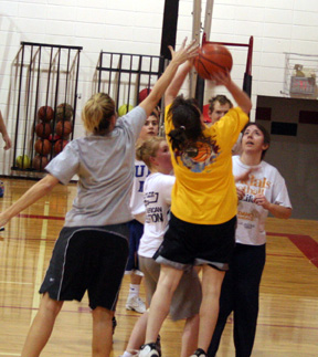 Tina (Mader) Ulmer tries to block Michelle Schaeffer from behind. Others shown from left are Tina's son (no name available), Alyssa Frei, Jared Nau and Brandy (Forsmann) McElroy.
