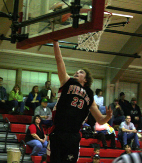 David Sigler scores his only points in the first half on a lay-up. He bounced back with 15 second half points.