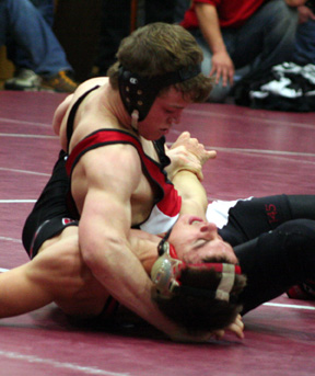 James Jackson works to score points against a Moscow wrestler on his way to a second place medal.