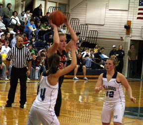 Mary Shears makes a pass from the high post.