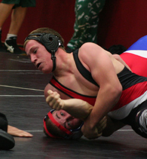 Brandon Poxleitner has his opponent in trouble at the Kamiah Tournament. He went on to earn a third place medal.