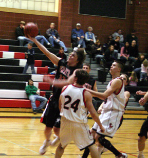 Branden Waller goes for a lay-up at Deary.