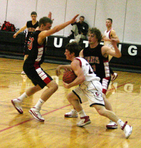 Devin Schmidt and David Sigler harass a Deary ballhandler.