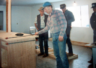 Working on the kitchen addition made to the hall in 1988.