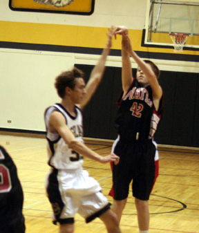 Beau Schlader puts up a shot from the outside at Highland.