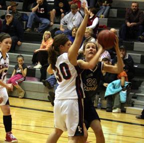 Savanah Prigge looks to shoot against Lewis County.
