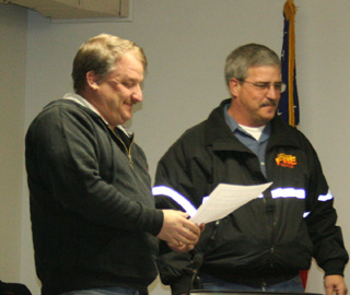 Councilor Jack Duman receives a Certificate of Commendation from the Mayor.