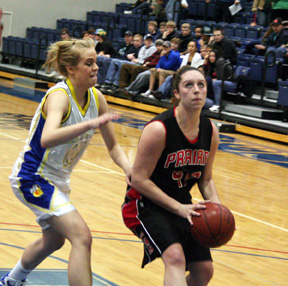 Kaylee Uhlenkott gets past the defender and is about to make a lay-up against Genesee.