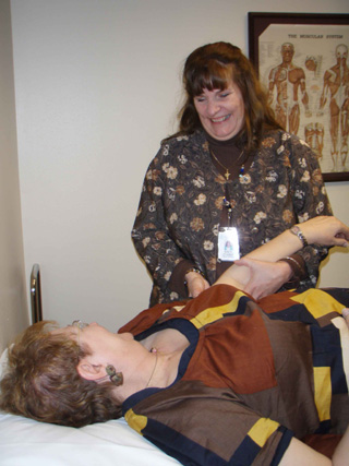 Kelly Howard, SMHC Physical Therapy Assistant, demonstrates the Leduc Method of treating lymphedema.  She completed her specialized training prior to joining the staff of St. Marys Hospital.