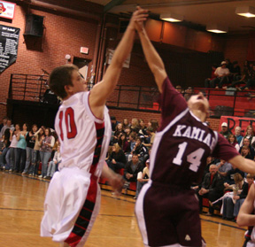 It looks like Kyle Holthaus got fouled on this shot attempt. He made one of the two free throws that followed.