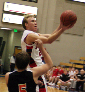 Devin Schmidt scoops one towards the basket.