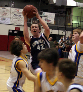 Josh Frei gets into the lane for a shot against Clark Fork.