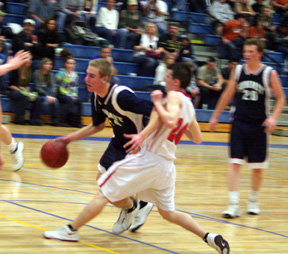 Dylan Prigge drives to the hoop against Mackay and appears to get fouled.