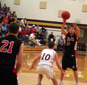 Kyle Holthaus passes to Conner Rieman in the Hagerman game.