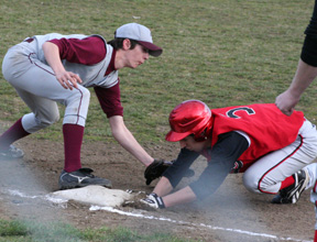 Tyler Rogers gets back to first in time to beat an attempted pickoff.