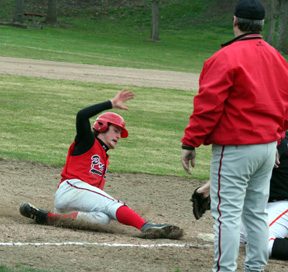 David Sigler slide into third with a triple right after Conner Rieman's (pictured aboved). Rieman scored the tying run on the play.