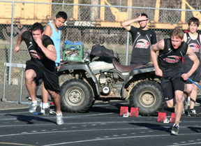 Kyler Shumway and Devin Schmidt at the start of the 100 meter dash. Schmidt wound up 1st and Shumway 3rd in the event.