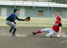 David Sigler slides safely into second base.